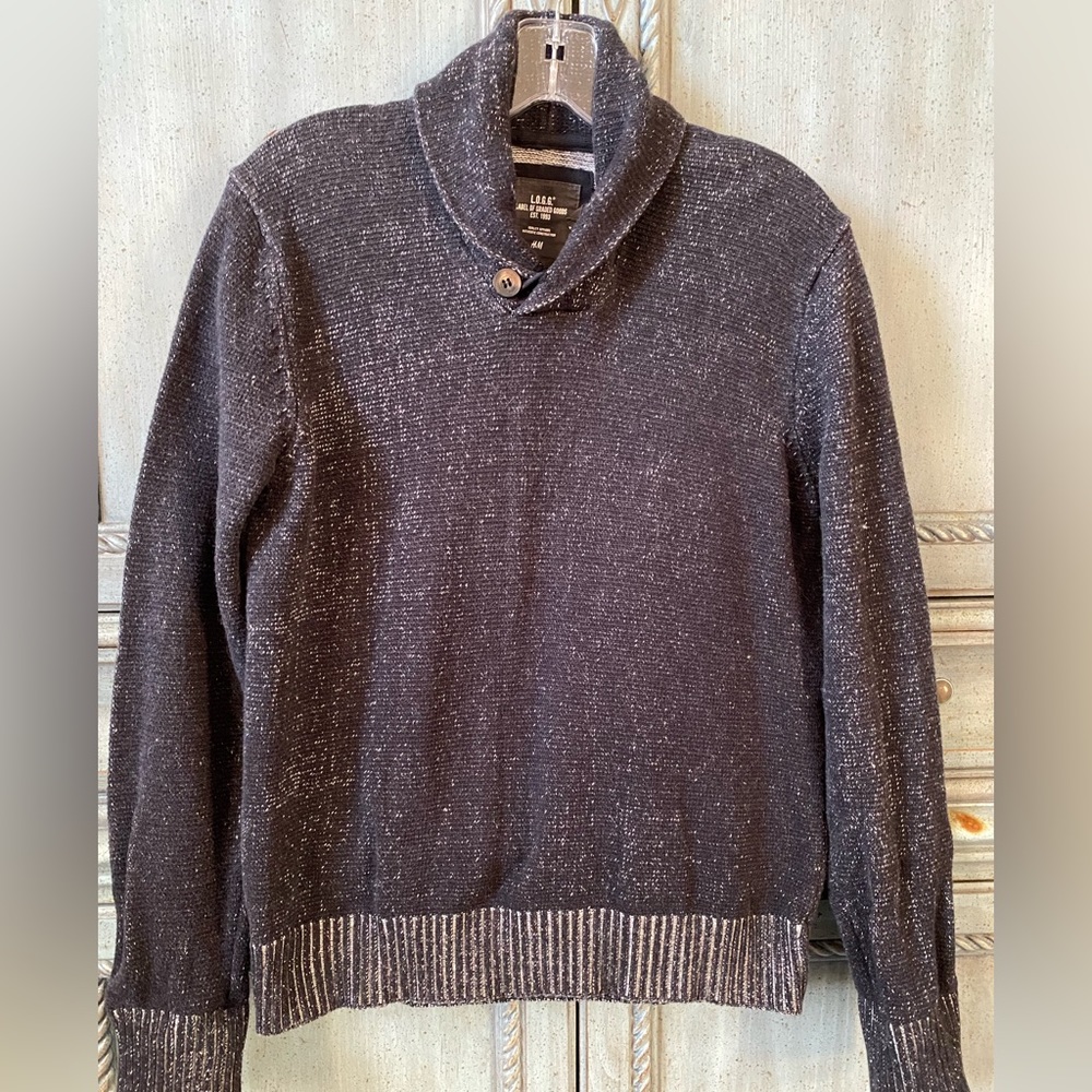 Black cotton sweater with white threads throughout